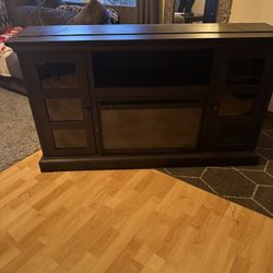 Free Tv Stand. Fireplace Is Broken 