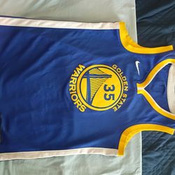 Blue and yellow golden state jersey  Youth XXL 