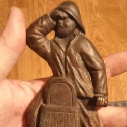 Vintage Cast Iron Fisherman 