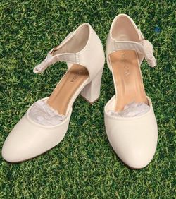 Size 6 white heels with strap around ankle, with box, used once