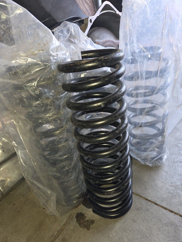 A Set Of 4 Coil Springs