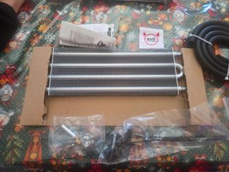 Universal oil (transmission oil) cooler. NEW.  Everything included.    Hablo Español se vende cooler de aceite universal