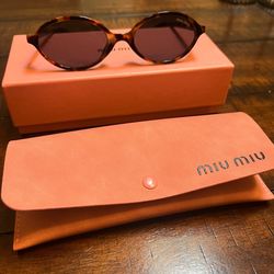 Miu Miu tortoise shell frame sunglasses