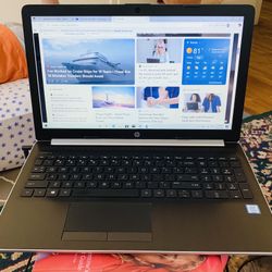 Laptop HP touchscreen 15”6 in , DVD-RW with charger cord.