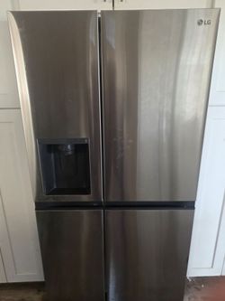 LG stainless steel Side by Side refrigerator moving sale