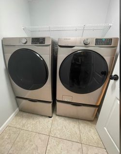Samsung Front Load Washer & Dryer Set with Storage Pedestals