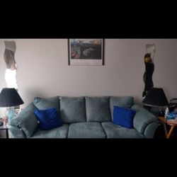 Couch With lamps and Pilllows