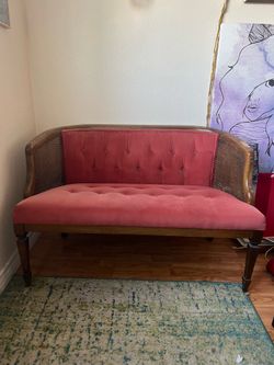 Pink velvet love seat
