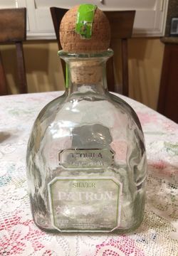 PATRON EMPTY BOTTLE. I NEED THREE 1.75 EMPTY BOTTLES WITH CORK CAP FOR A PROJECT. I CAN PAY A FEW BUCKS.