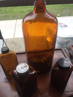 4 antique hand blown glass medical bottles