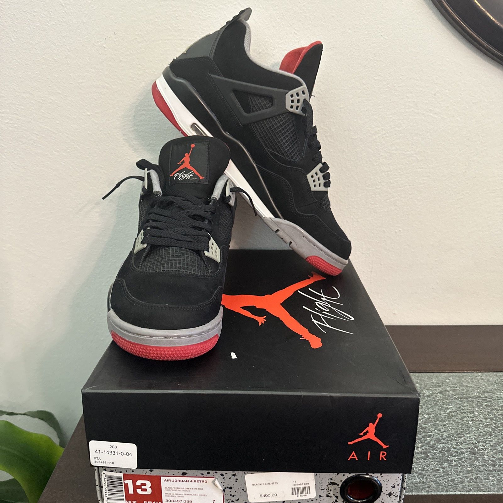 Preowned Nike Air Jordan IV Retro "2012 Black Cement" (Men's Size 13) 308497-089