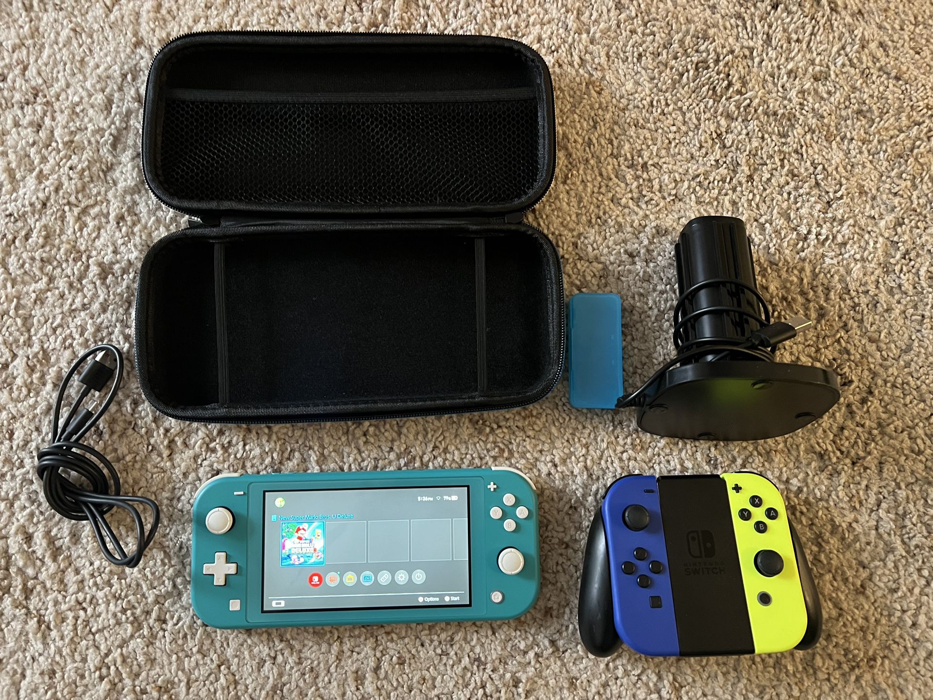 Nintendo Switch Lite with Mario Bros game and extra controller