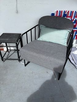 Upscale patio chairs with cushions. .