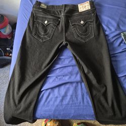 true religion jeans,black with grey stitching, waist 34 Length 30