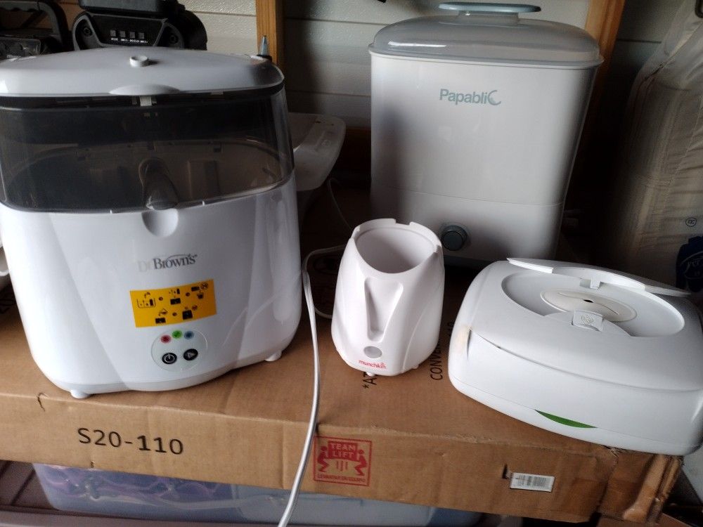 A Lot Of Baby Sanitizers Wipes And Warmers