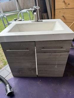 Single Sink White Washed Bath Vanity And Faucet