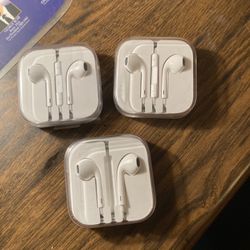 3 Pair Of iPhones New / Plugs In Bottom Of iPhones 