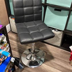 Black Chair Rotates And Goes Up And Down 