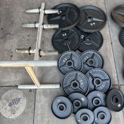 Old school Olympic weights 310lbs total plus weights tree firm price