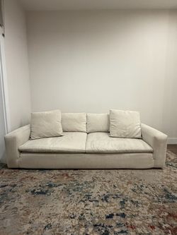 Beige cloud-like sofa