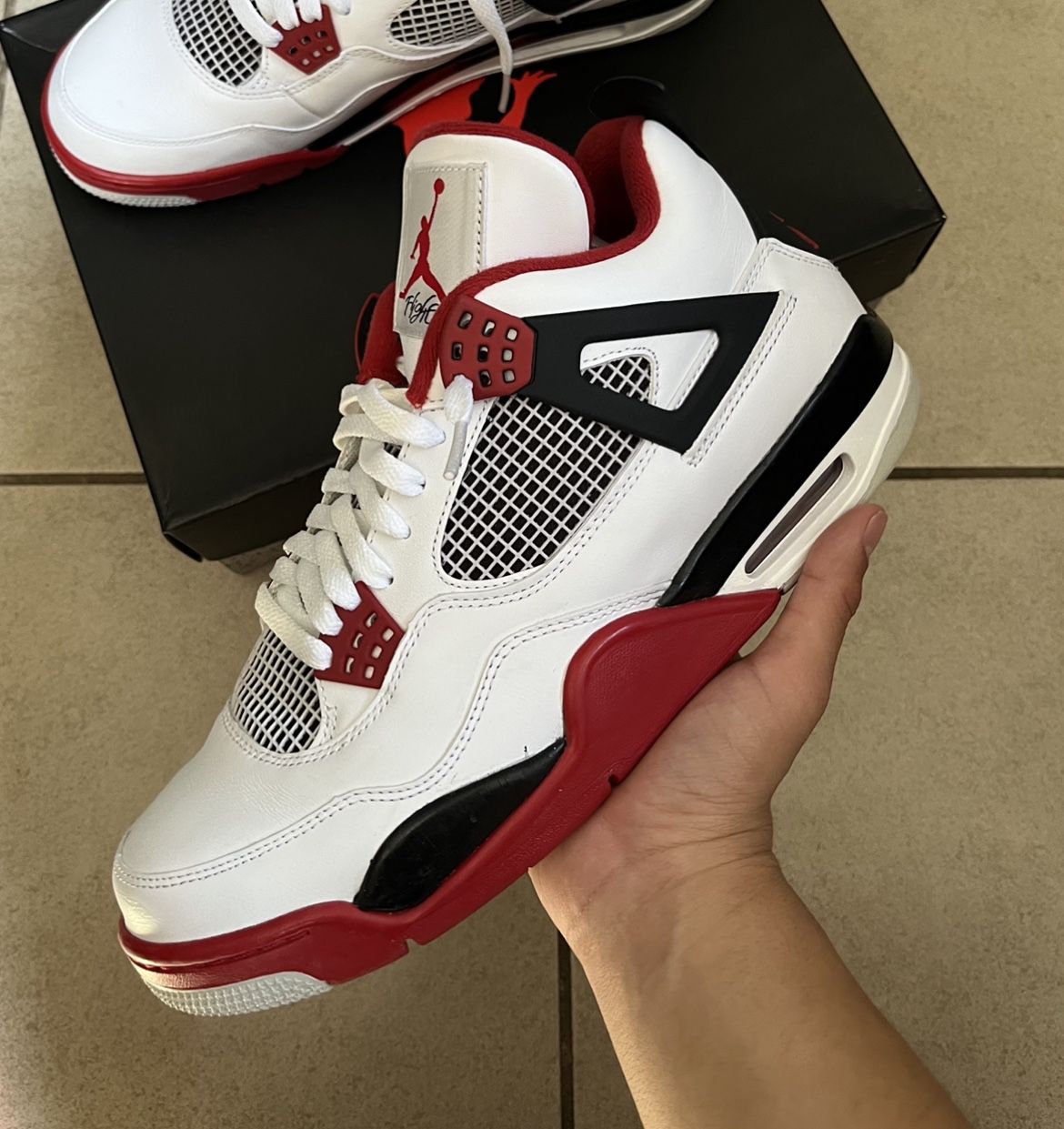 Jordan 4 “Fire Red” (Size 10.5)