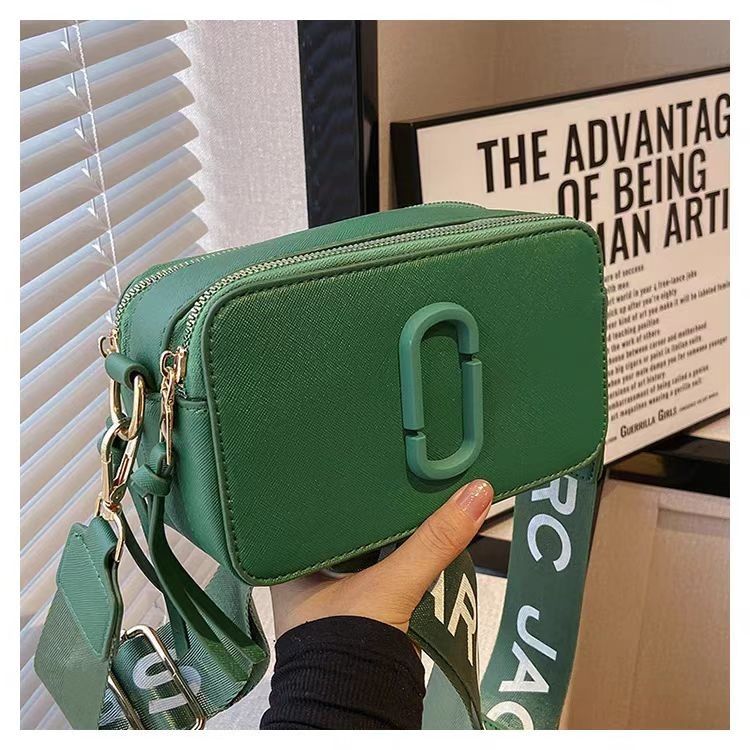Women's camera bags are fashionable and versatile with wide shoulder straps