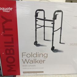 BRAND NEW, IN BOX, FOLDING WALKER