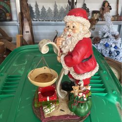 Santa Candle Holder 10 Dollars Mickey Mouse Snow Globe 10 Dollars 