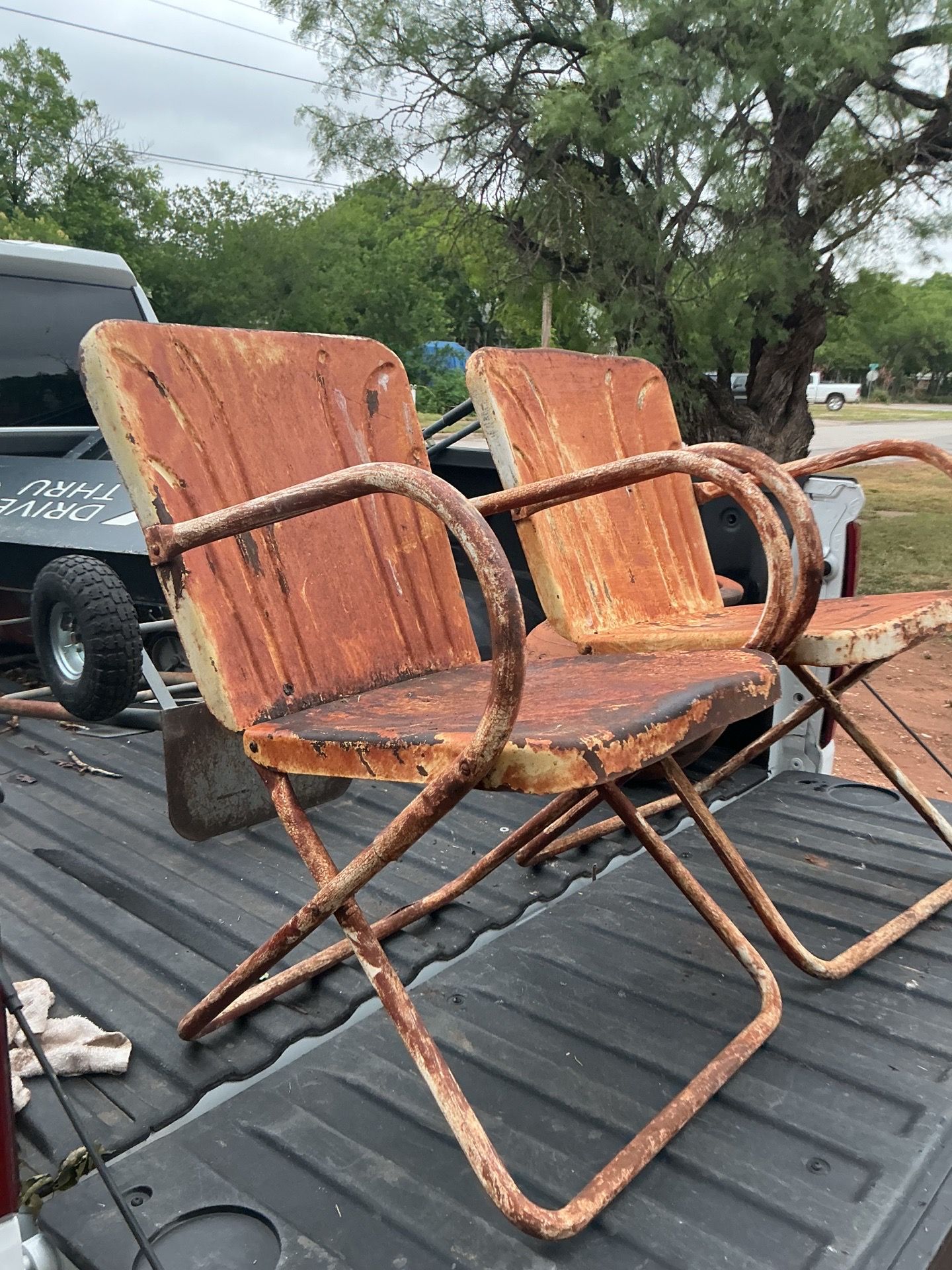 A pair of metal chairs