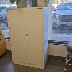 Folding metal cabinet with lock and keys