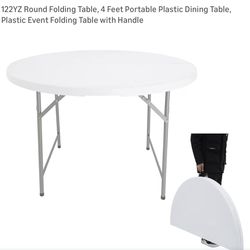 Four 48" round folding tables with handle