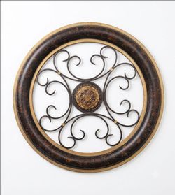 ELEGANT METAL WALL ART -  ROUND DESIGN WITH ORNATE CENTER!
33” DIAMETER LIKE NEW. A TRUE STATEMENT PIECE.