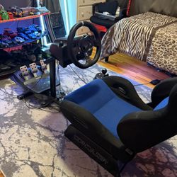 LOGITECH G299 XBOX/PC COMES WITH STAND AND SEAT... PSA SHIFTER DONT WORK. Willing to trade for PS