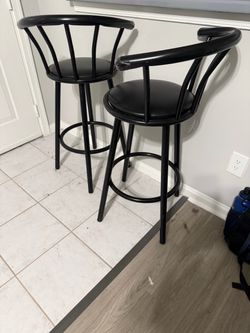 2 metal barstools