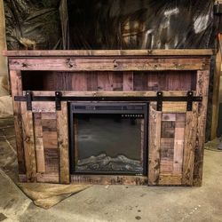 Custom made rustic farmhouse style tv stands with integrated fireplace inserts