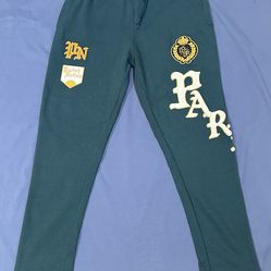 Parish Nation joggers in a dark green color. Size medium.