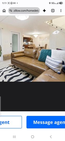 Beautiful brown leather sectional sofa in excellent condition!