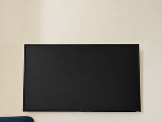 ONN Roku Smart TV 50’ Flat Screen with wall mount and stand