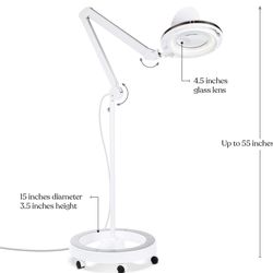 Magnifying rolling esthetician light
