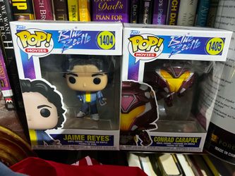 Pair of new funko blue beetle figures still in original box