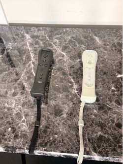 2 Genuine Nintendo Wii Remote Controllers – Black & White