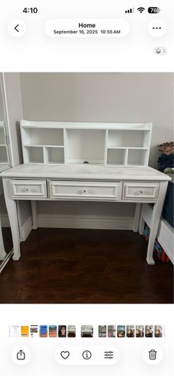 White desk with attached bookshelf