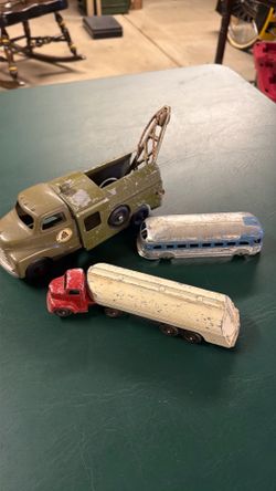 Three antique TOY  TRUCKS / BUS