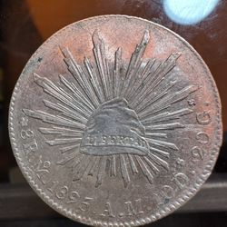 Mexican 8 Reales silver coin from the First Republic period, dated 1895.  