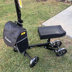 Brand New Assembled- knee scooter, four wheels padded seat. Left and right side compatible.