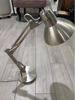 Adjustable desk lamp with weighted base