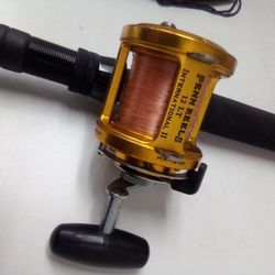 Penn 12 LT International II Reel W/ Quantum Blue Runner Gold Rod