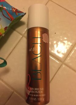Body spray bronzer