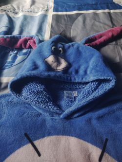Winnie the Pooh sweater in wonderful condition