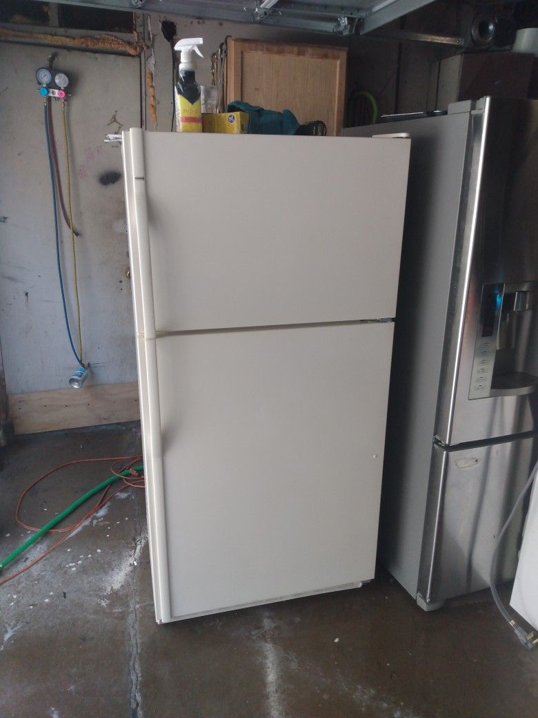 Kenmore Light Cream Colored Up And Down Refrigerator